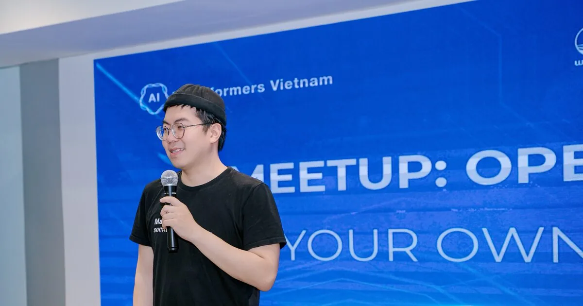 Daniel Nguyen speaking on stage at an AI meetup